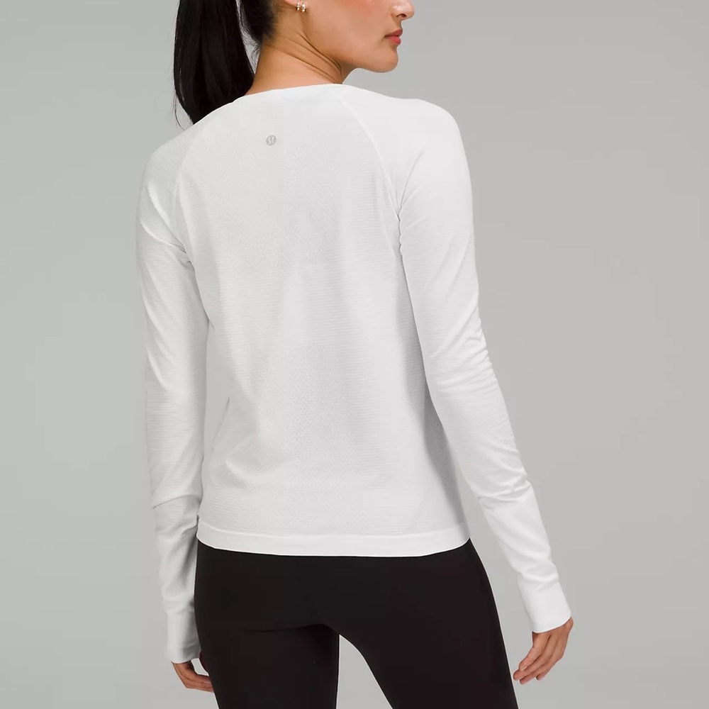 White long sleeve swiftly Lululemon shirt! (Size 6)